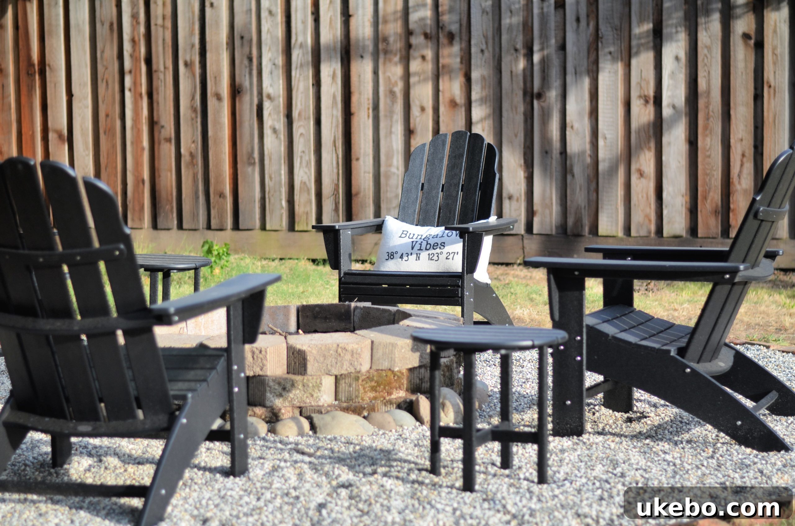 POLYWOOD Vineyard Curveback Adirondack Chairs with side tables in the fire pit area