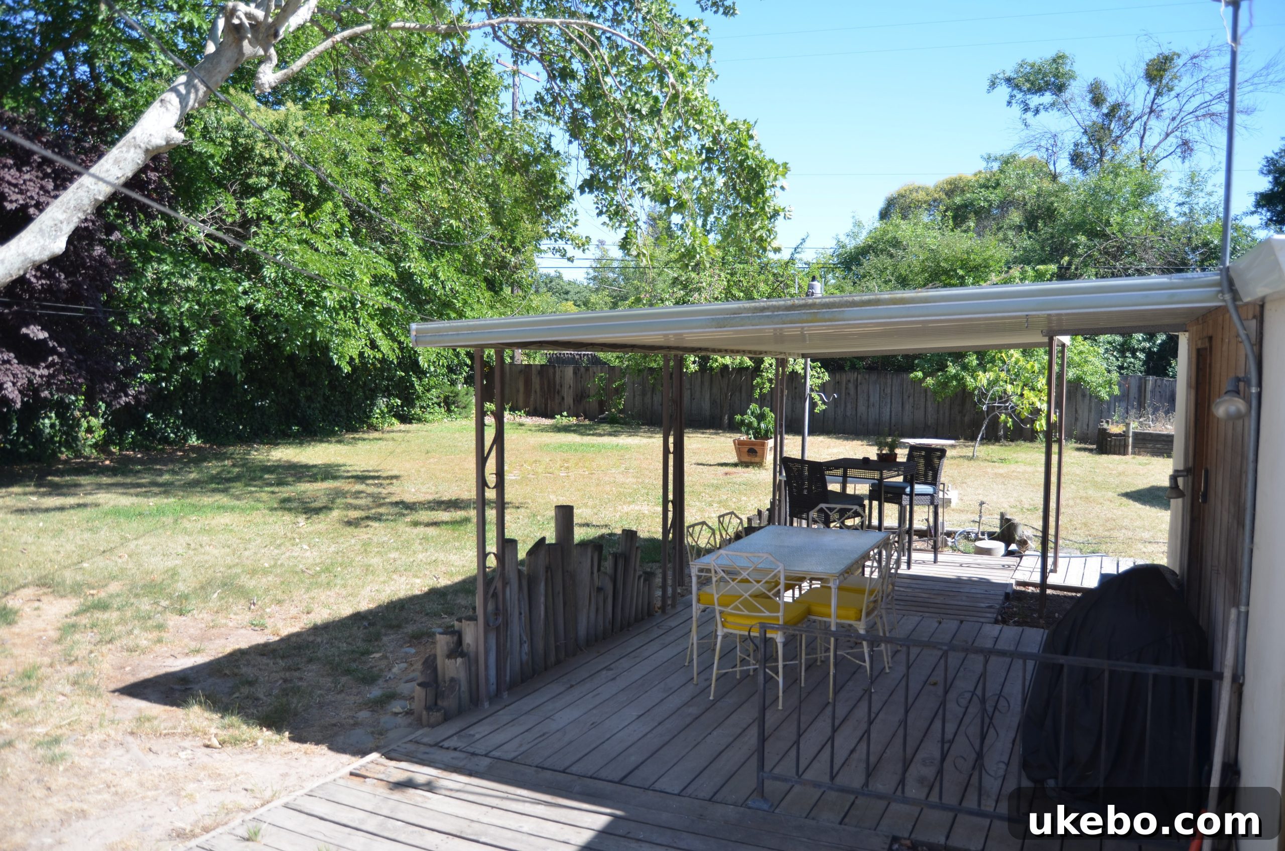 Crafting Your Perfect Summer Outdoor Oasis with POLYWOOD 3 Before: Dilapidated metal pergola and neglected garden space