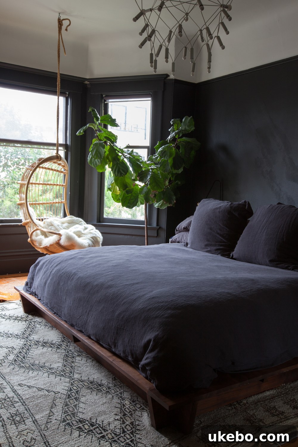 Valspar Dark Kettle Black creating a moody, sophisticated atmosphere in a room, highlighting its charcoal undertones on walls