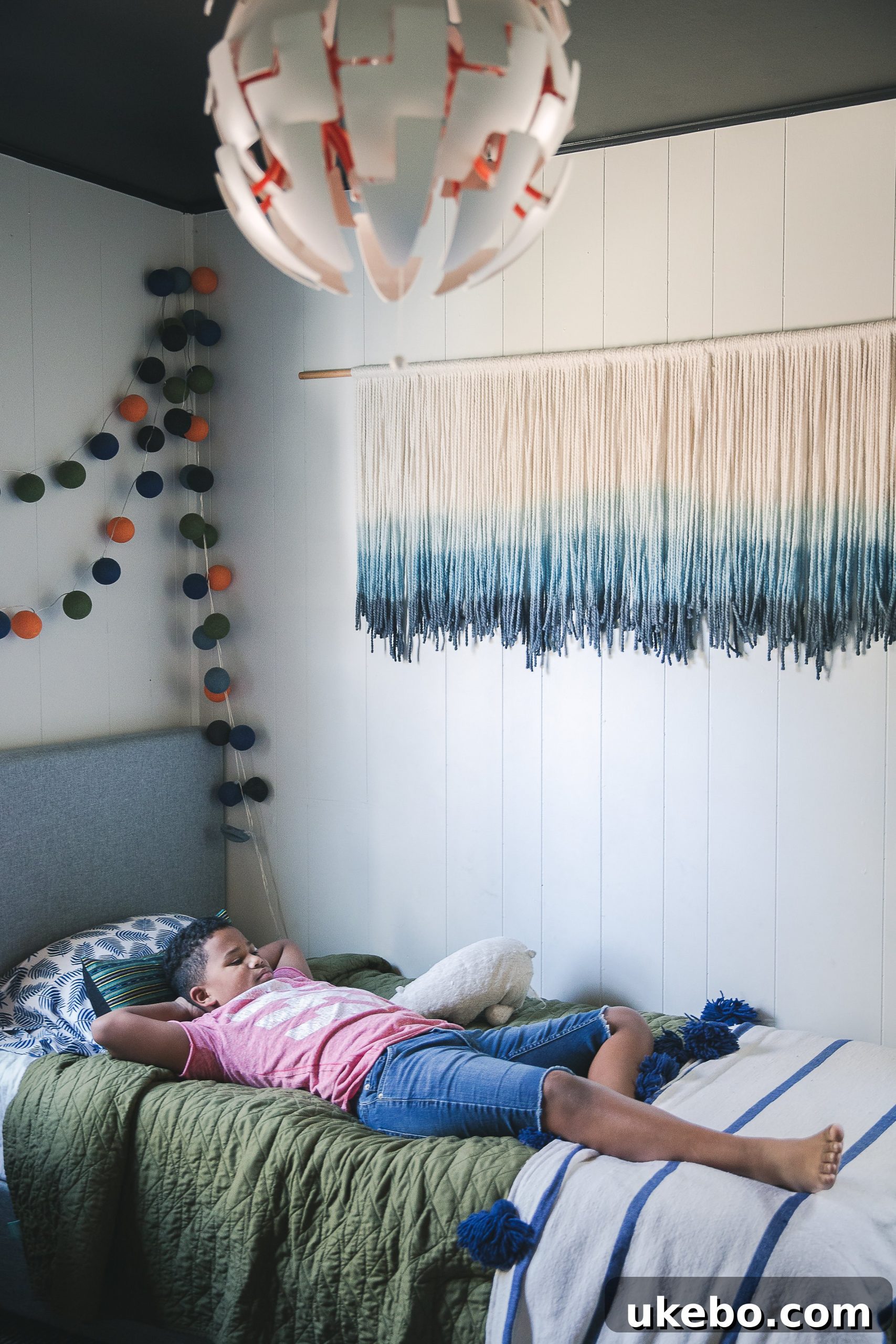 Close up of a wall painted with Francesca by Martha Stewart, appearing as a warm, rich black with subtle grey undertones