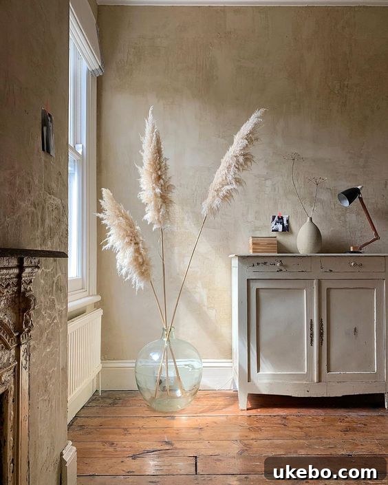 Pampas grass adding a warm, bohemian touch to a modern living space with textured textiles