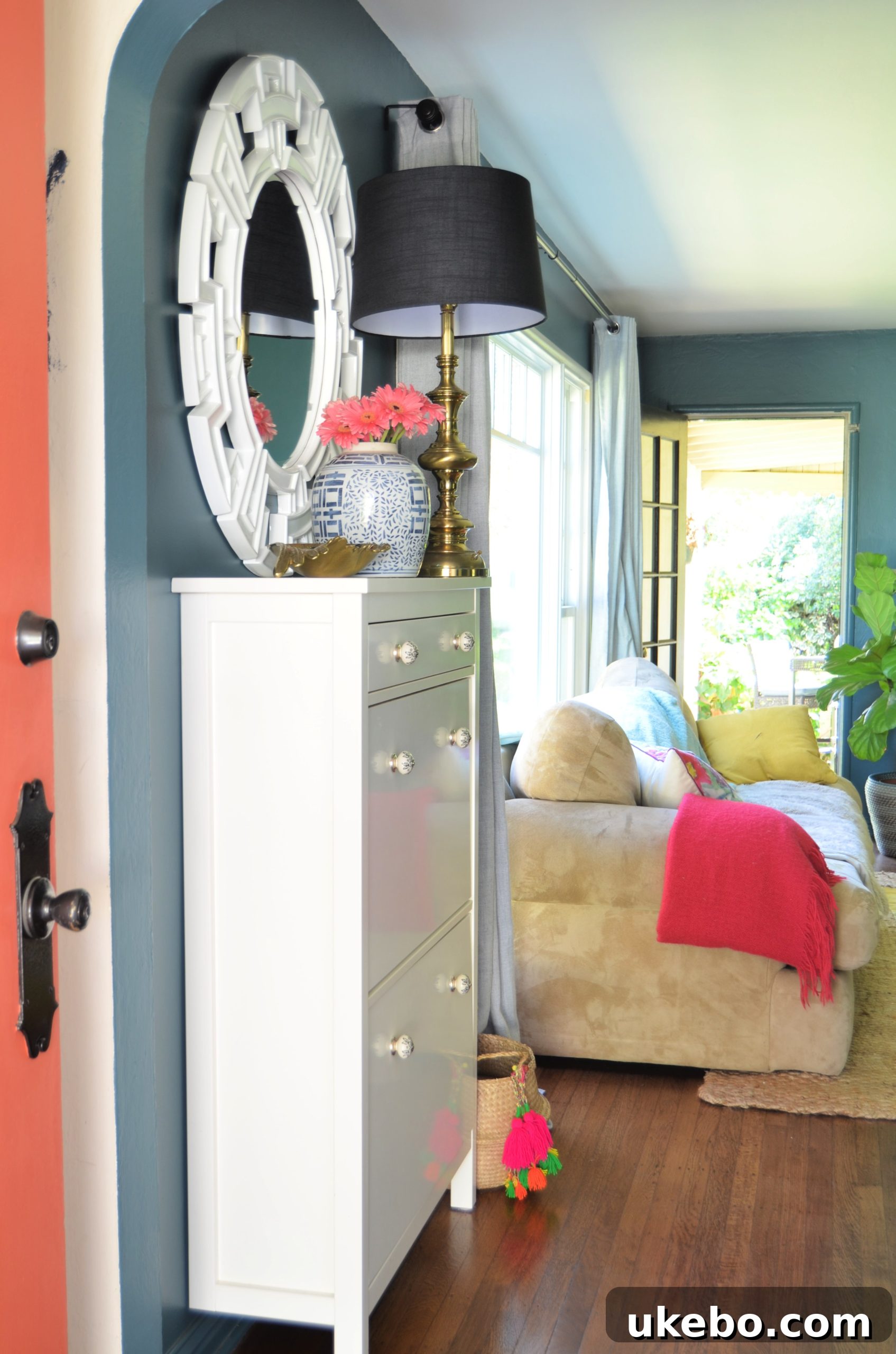A HEMNES shoe cabinet styled with plants and books, enhancing its aesthetic appeal.