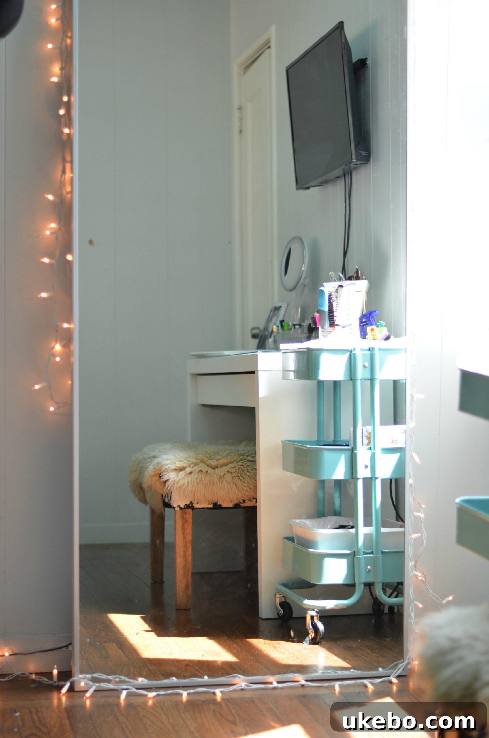 Close-up of the HOVET Mirror, showcasing its sleek aluminum frame and reflective quality.