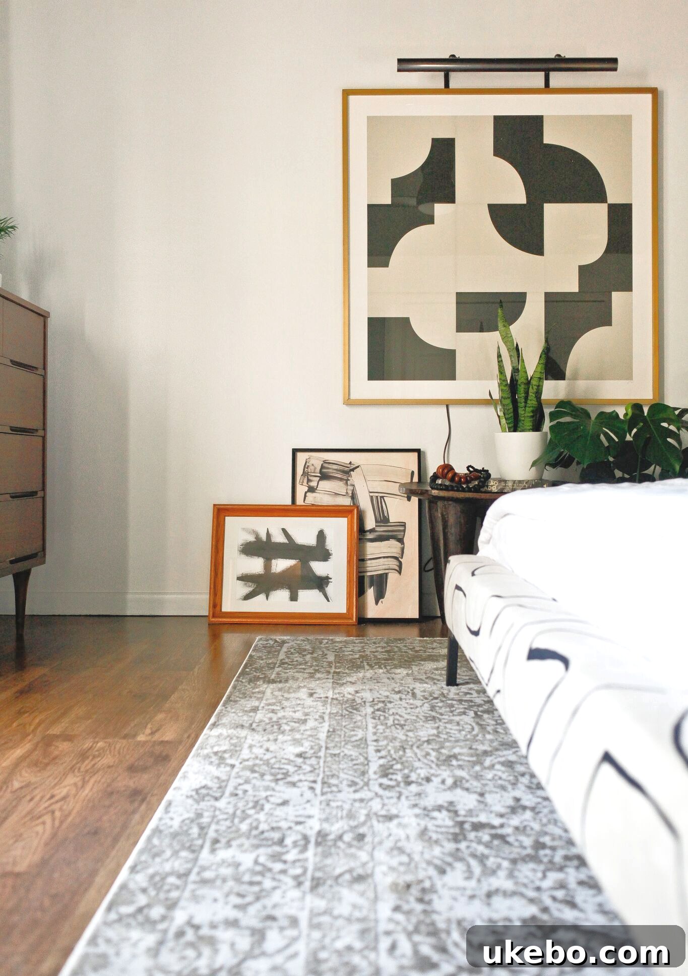 Master bedroom featuring contrasting white walls and a dark, moody ceiling for dramatic effect