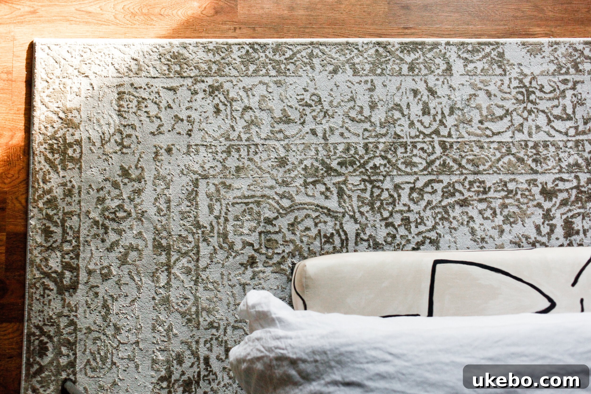 Curated art collection in the master bedroom, featuring a large contemporary piece from Minted