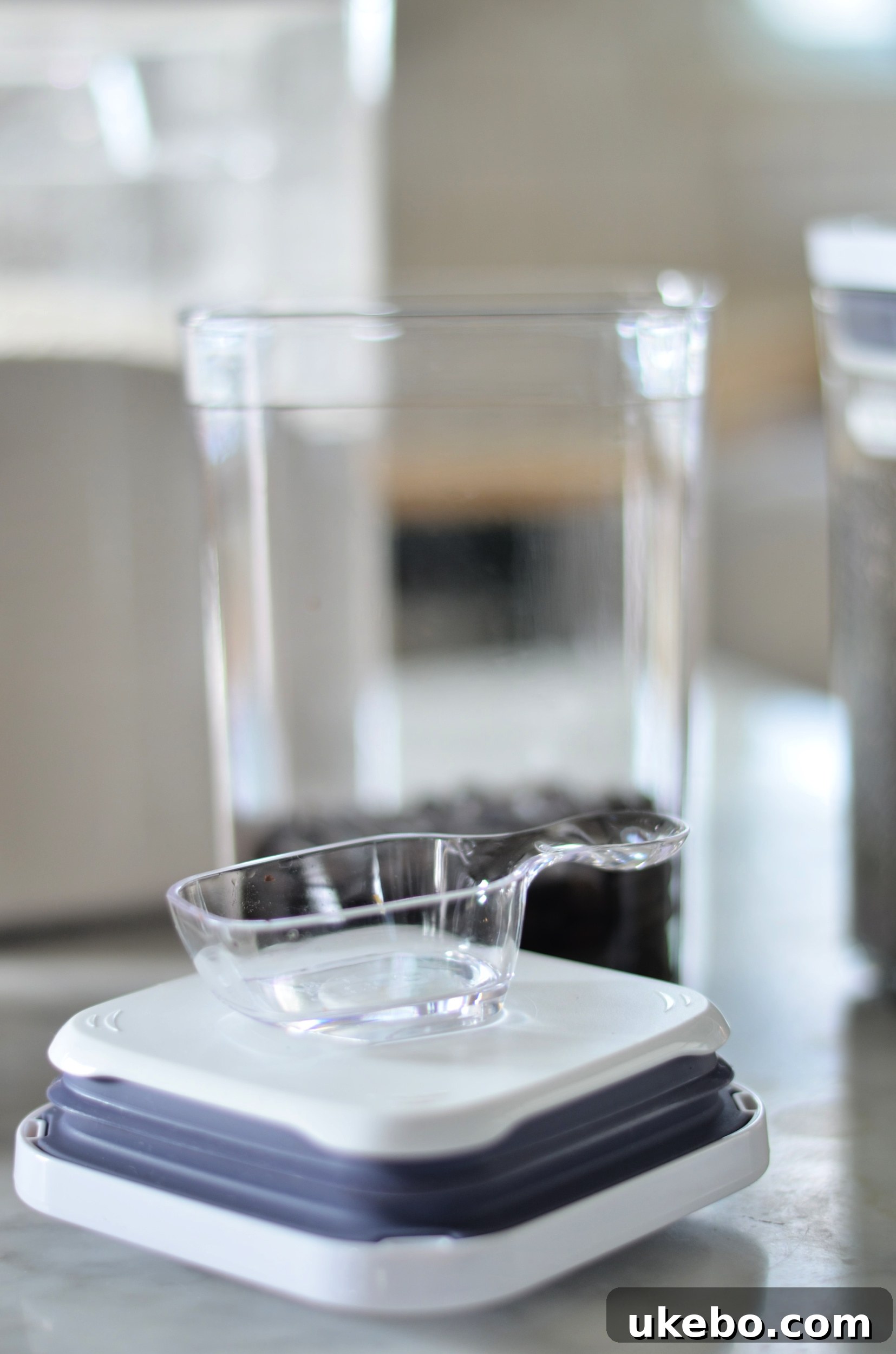 Various scoops designed to attach to OXO POP container lids