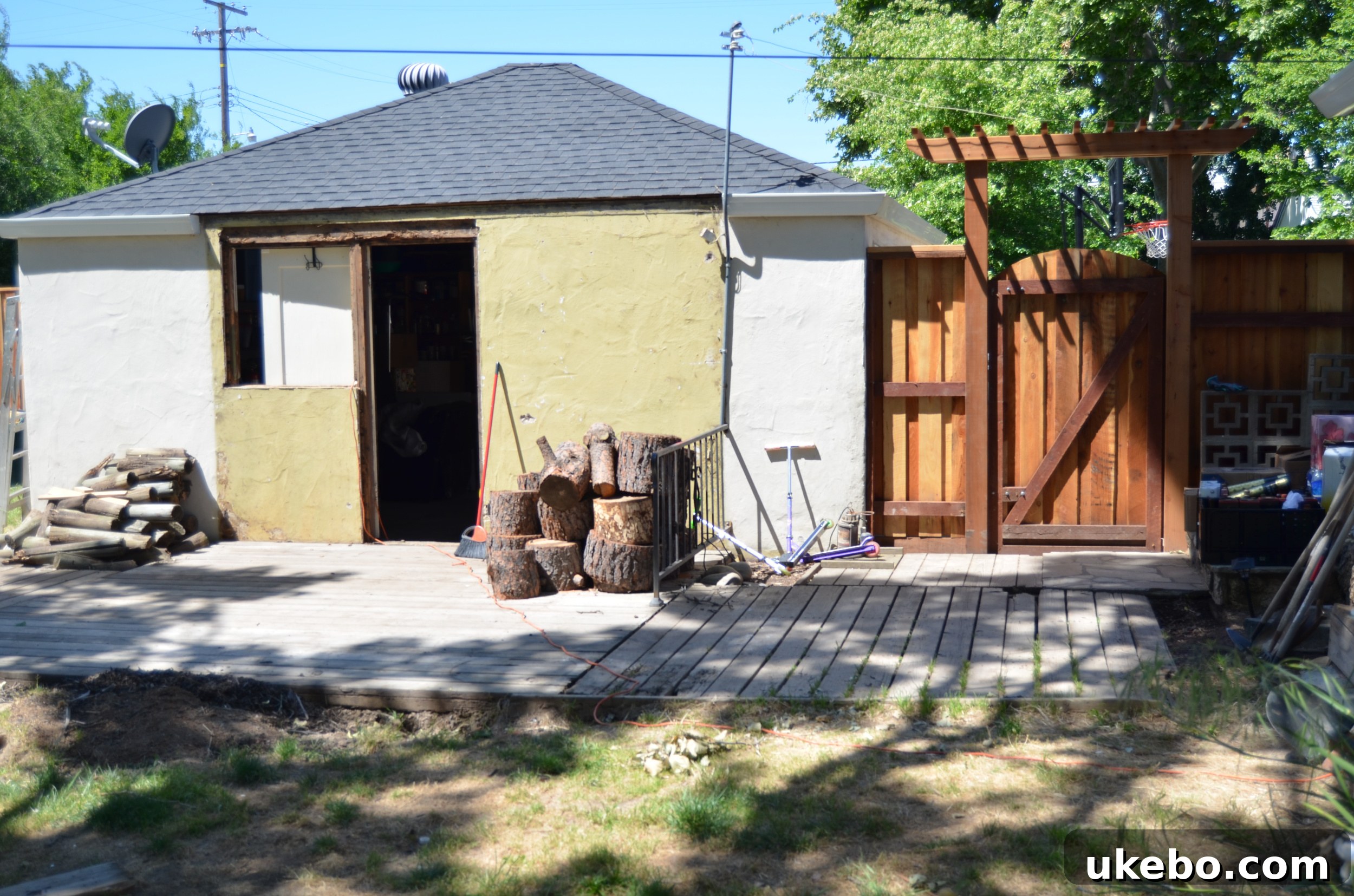 New fence and well-crafted entry gates installed in the backyard perimeter