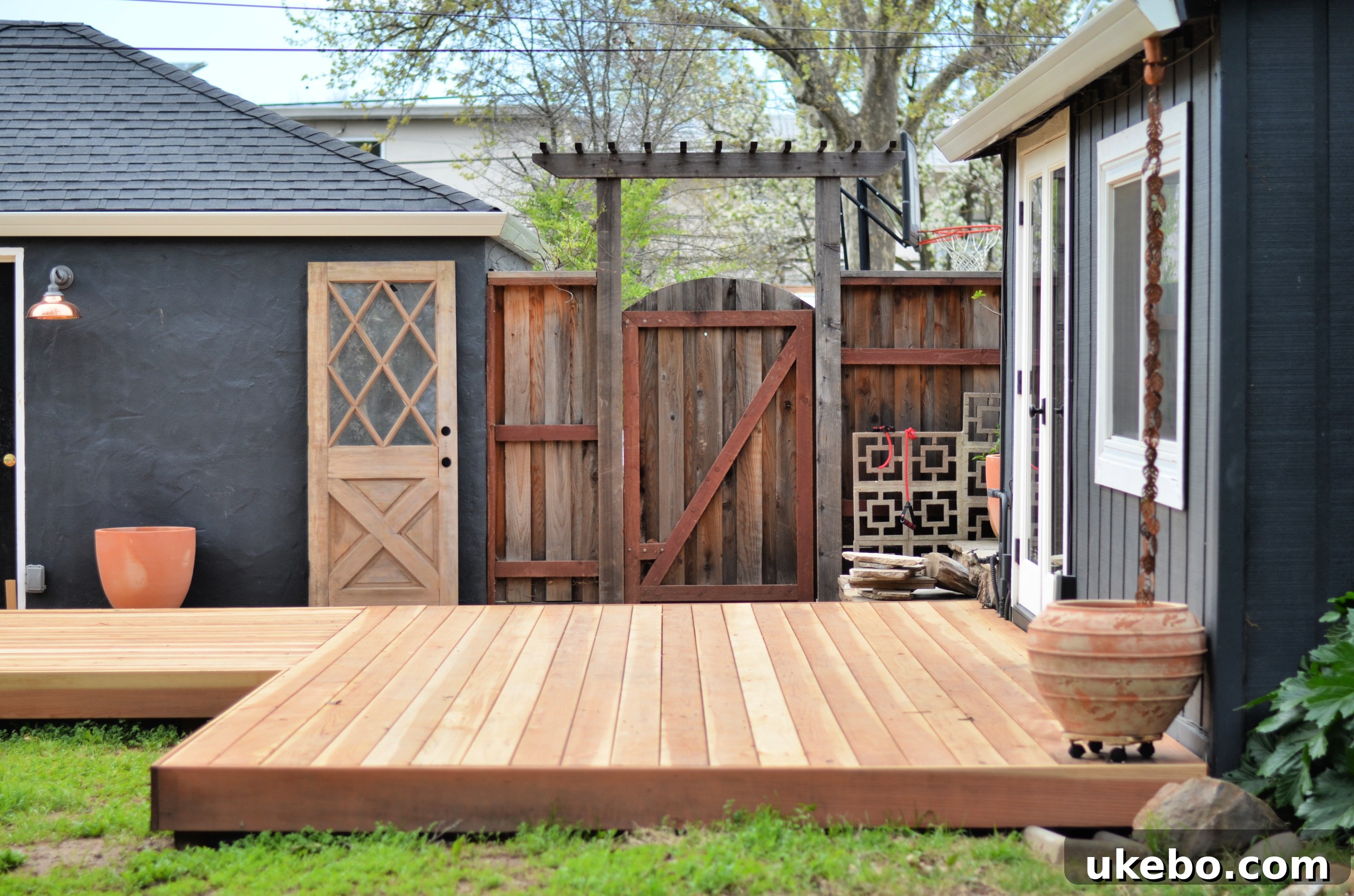 Deck nearing completion, showcasing the elegant L-shape design and solid construction