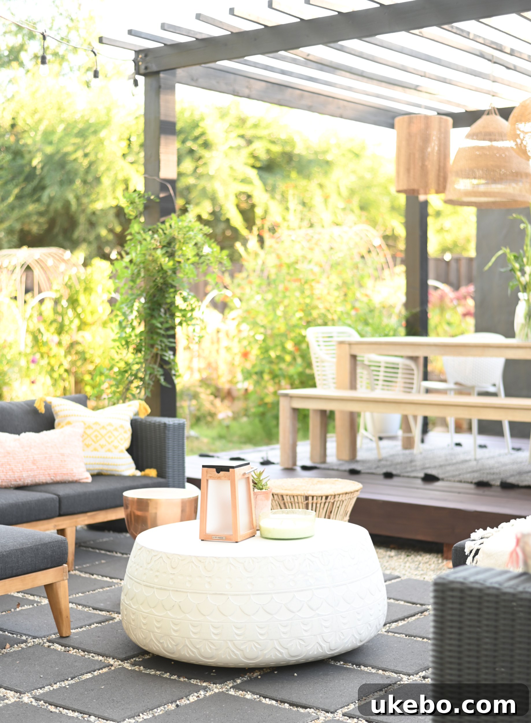 Patio lounge area with various tables and plants