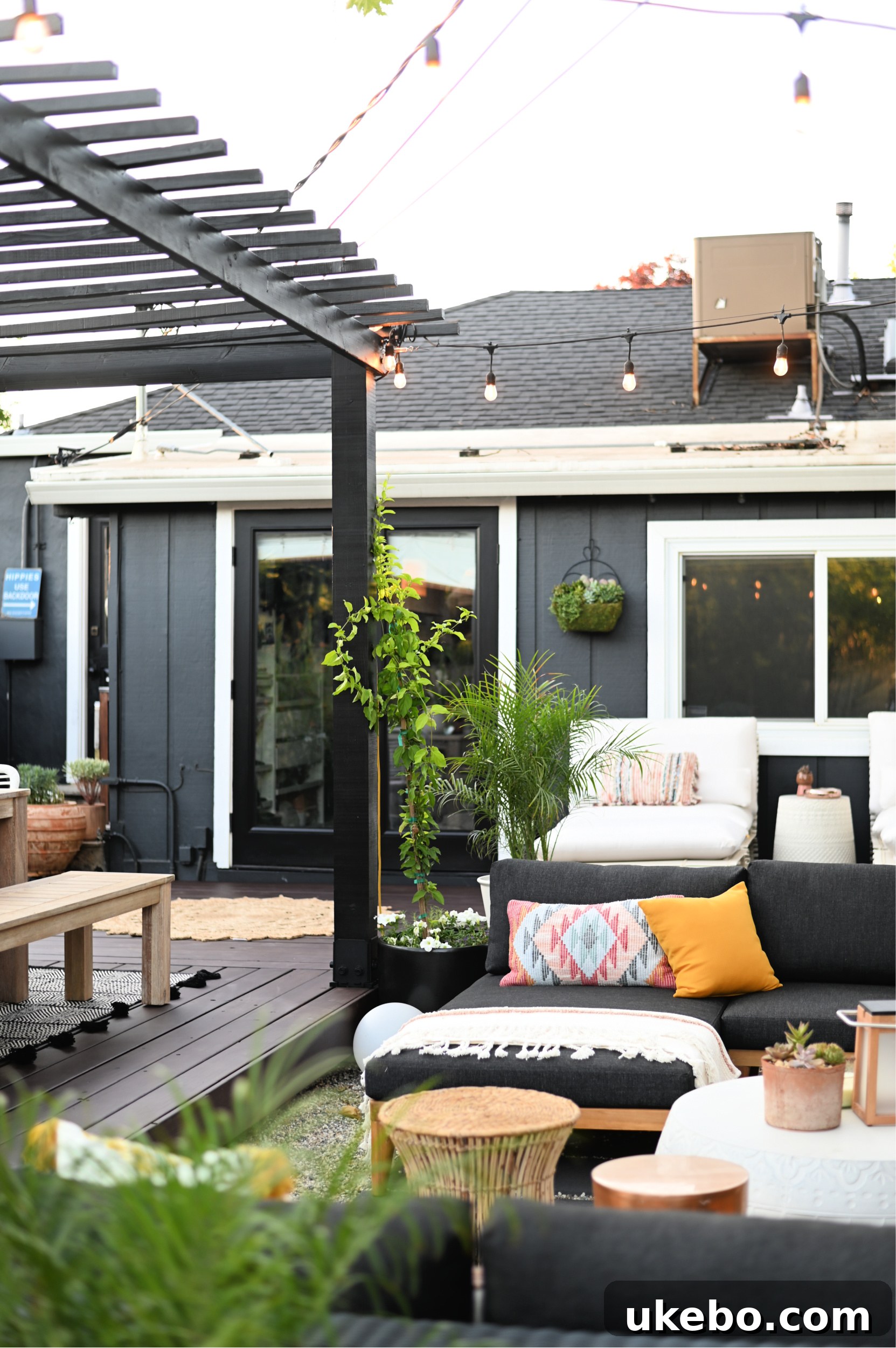 Outdoor furniture and lush plants
