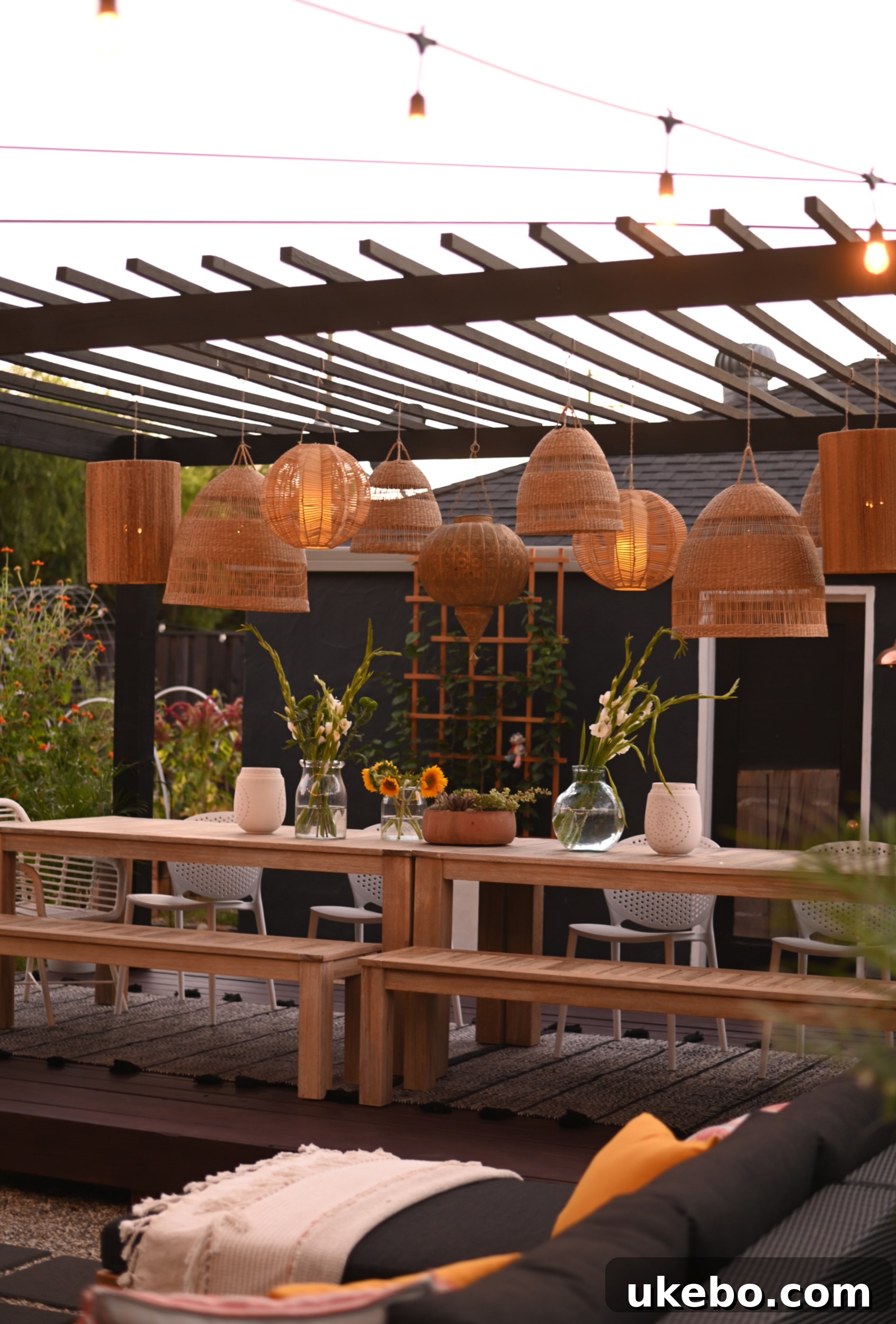 Dining area at night with pendant lights