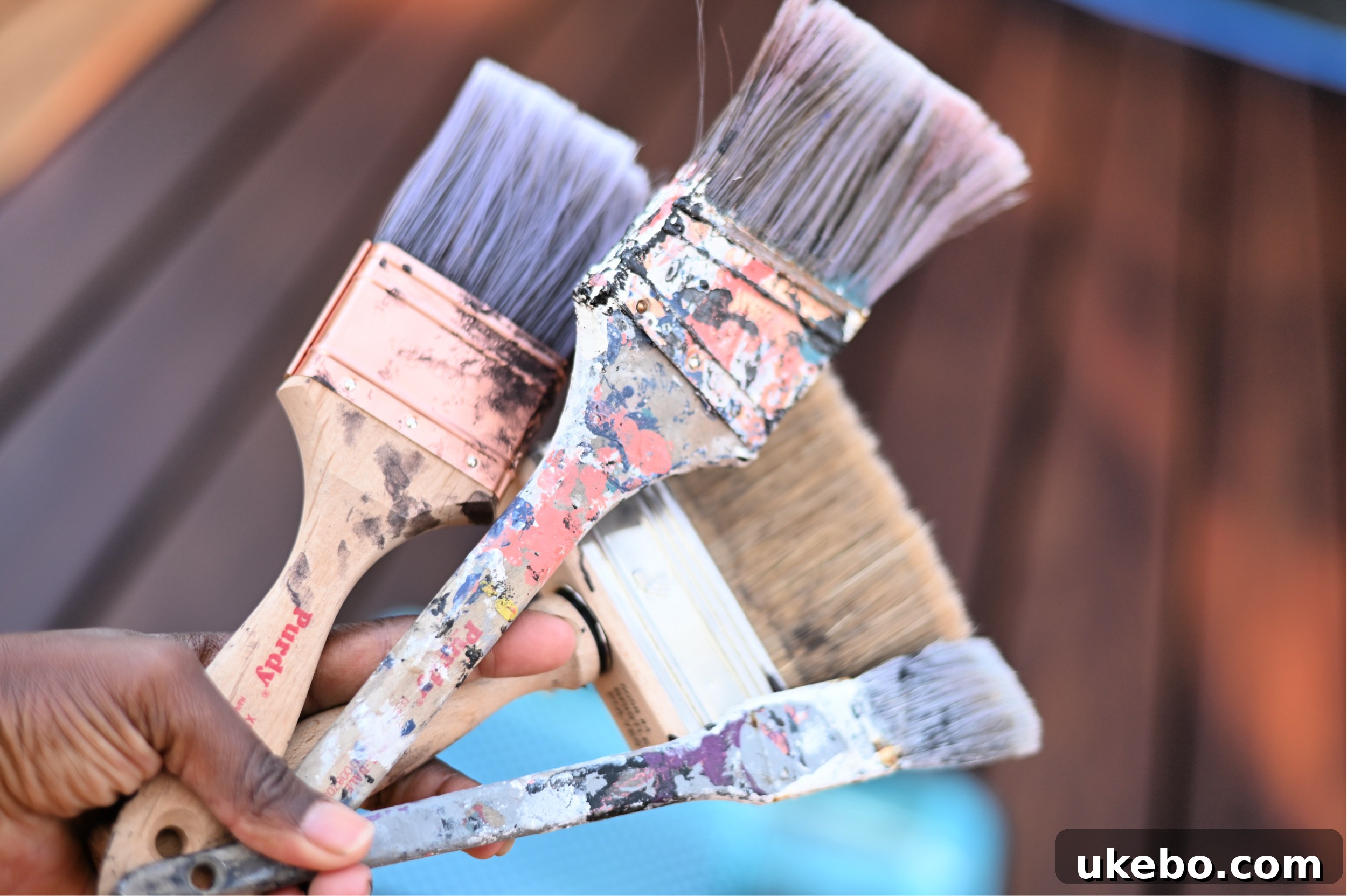 Bringing Our Deck Back to Life with Sherwin-Williams 19 Using a Purdy brush for deck staining