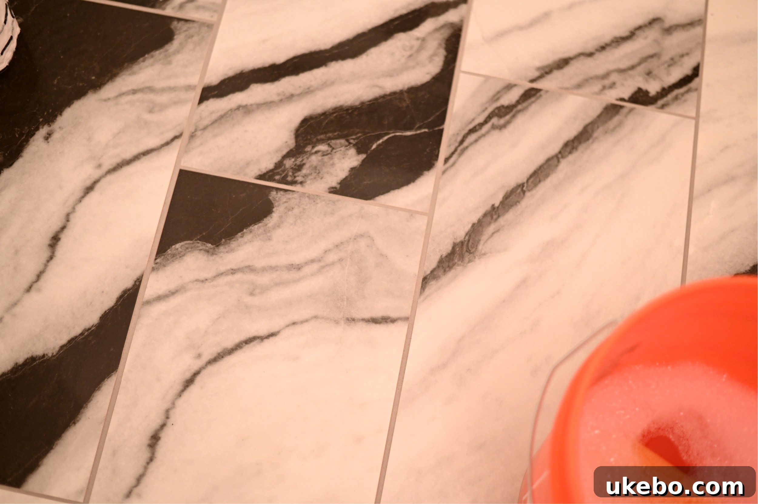 A close-up showing the finished grouted QuicTile floor, highlighting the fresh, clean look.