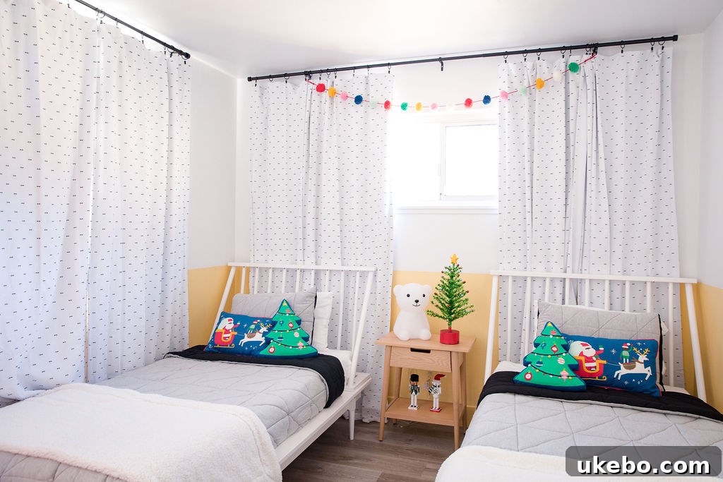 Brightly decorated twin beds with playful holiday accents and colorful bedding in the kids' room, offering shared kids' room ideas.