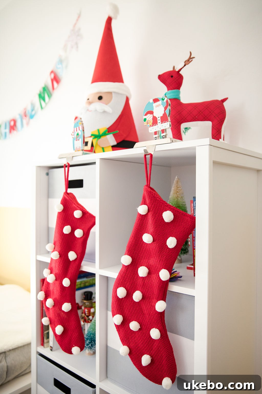 Kids' holiday decor details, including themed pillows and playful accessories, perfect for a joyful children's space.