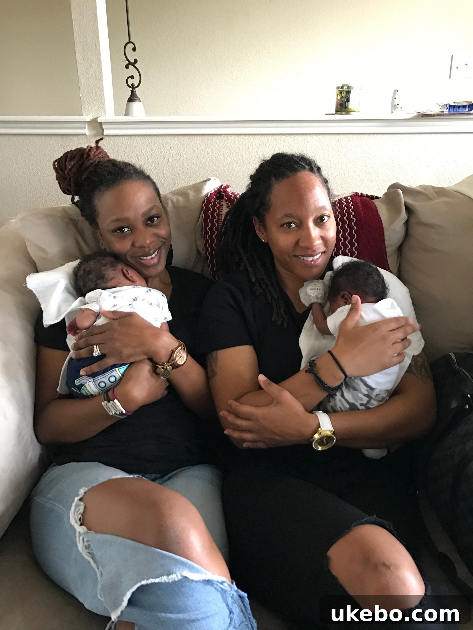 Close-up of cozy twin beds with festive holiday bedding in the boys' redesigned room. Ideal for shared kids' room inspiration.