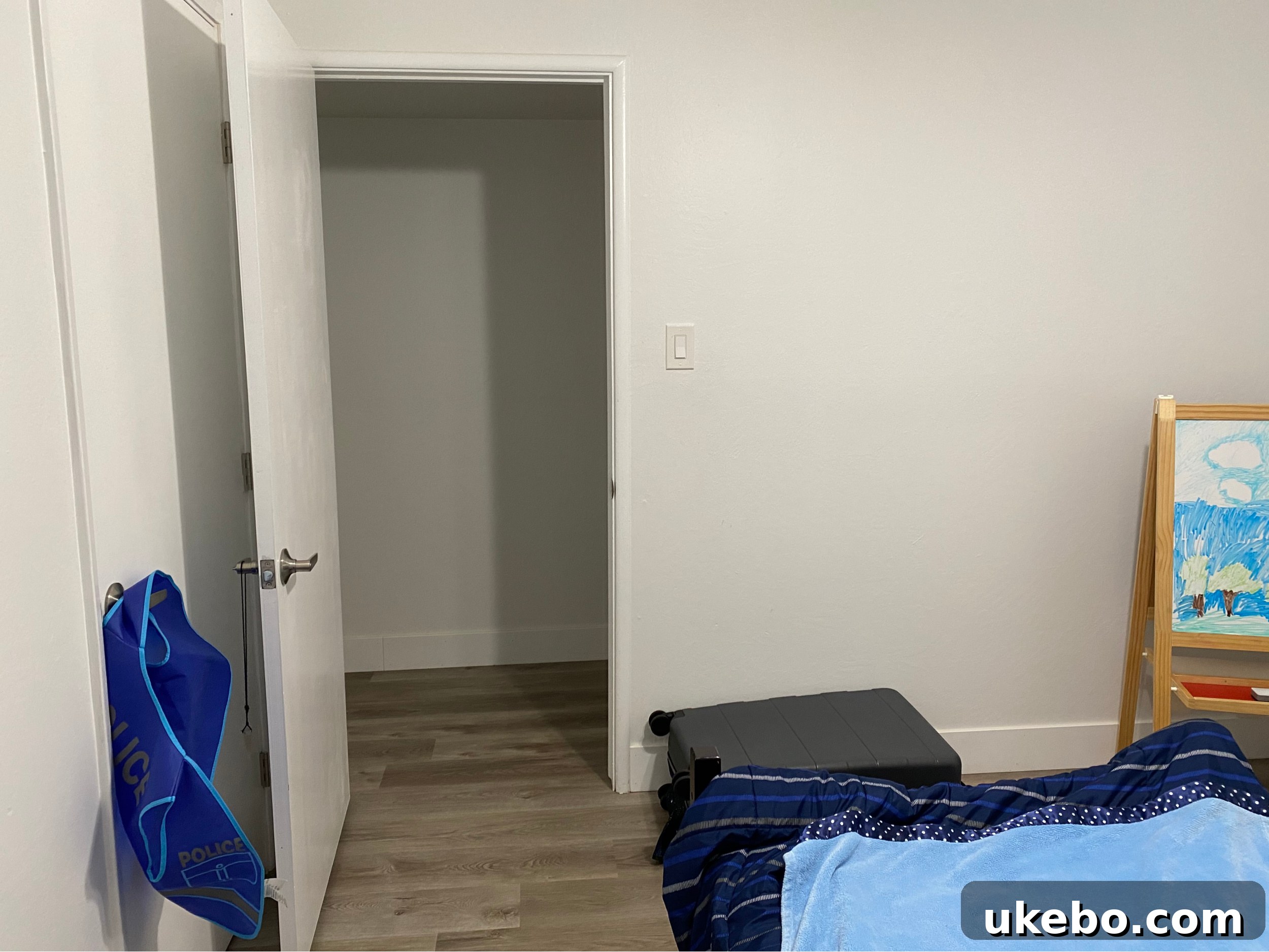 Devin's bed area before the makeover, showcasing the need for a more personalized design