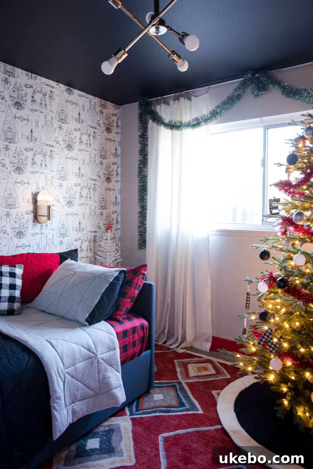 Devin's newly designed Star Wars themed bedroom, featuring red accents and a black ceiling