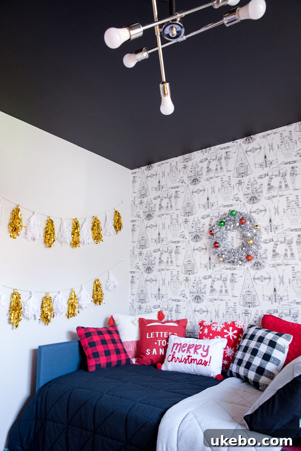 Overhead view of Devin's room showcasing the bold black ceiling and cohesive design
