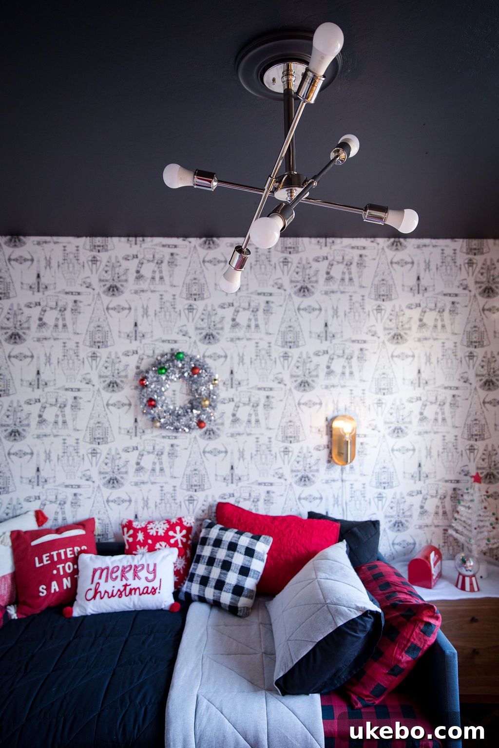 Detailed view of the red painted door and baseboards, harmonizing with the room's color scheme
