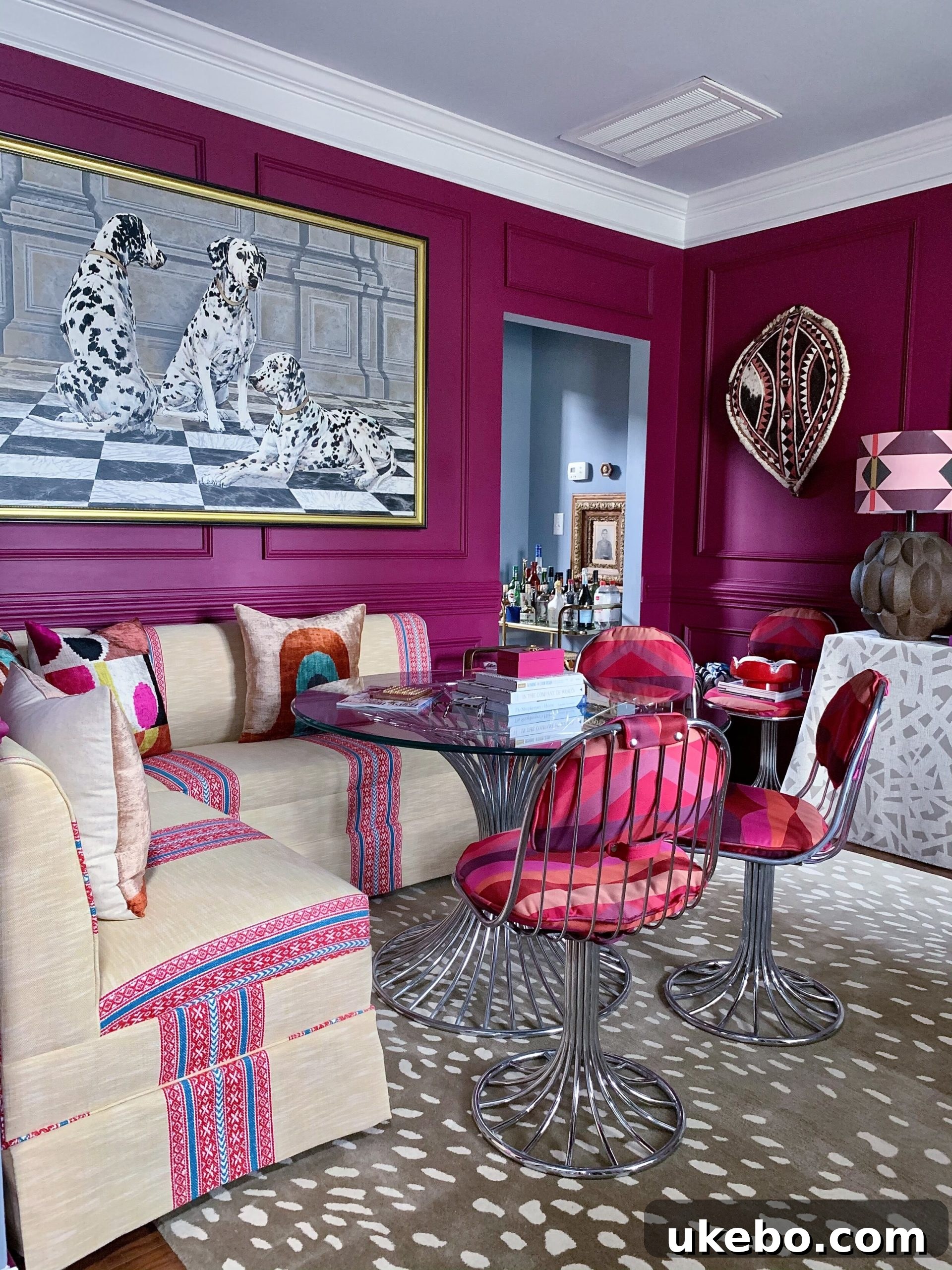 Ariene's office featuring Frambroise magenta walls