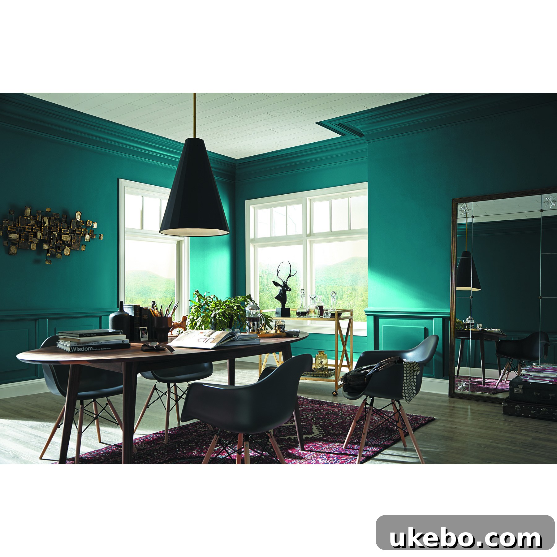 Living room with a bold Oceanside teal accent wall
