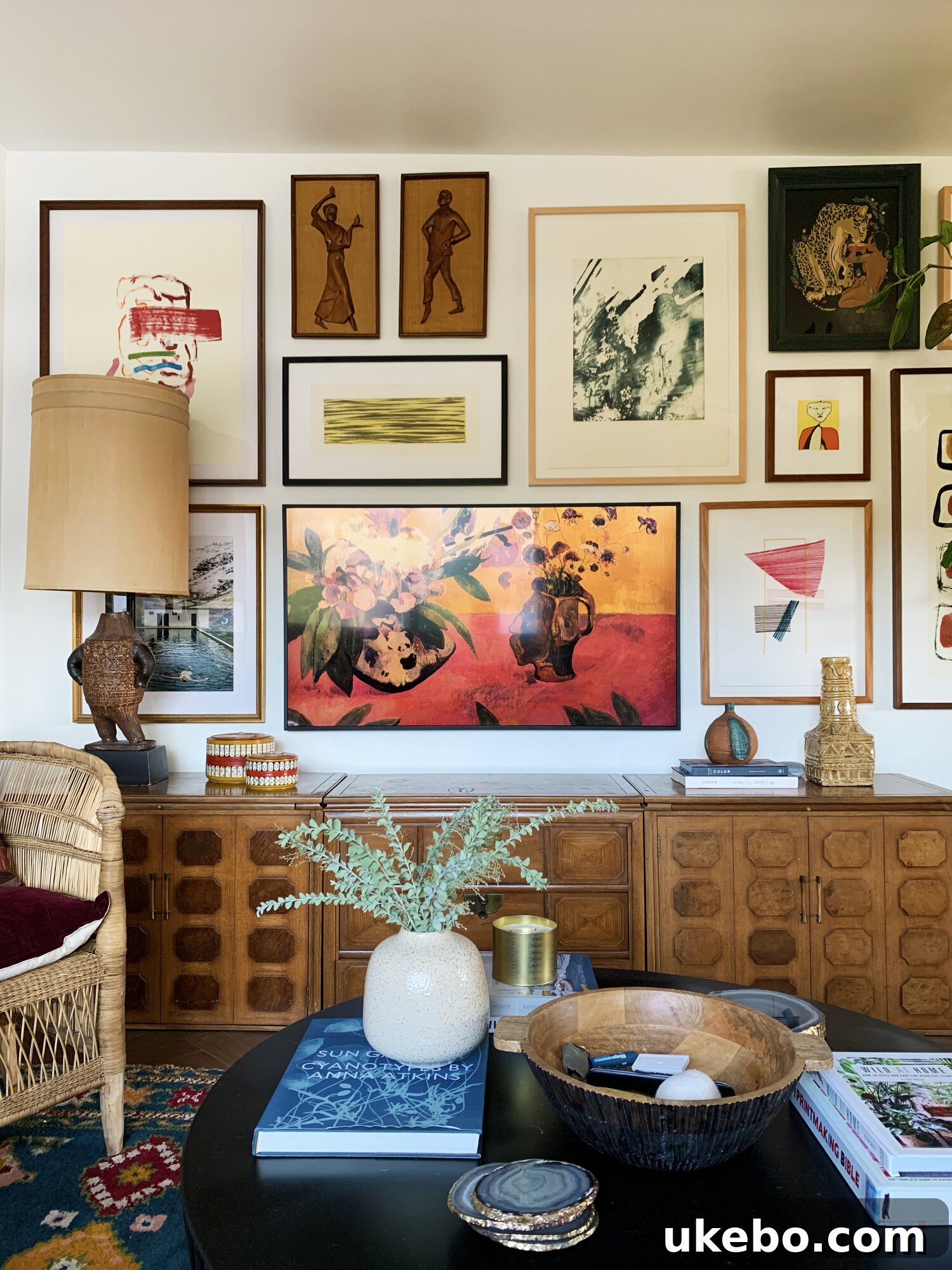 A closer view of the Samsung Frame TV displaying vibrant artwork, part of a chic home interior.