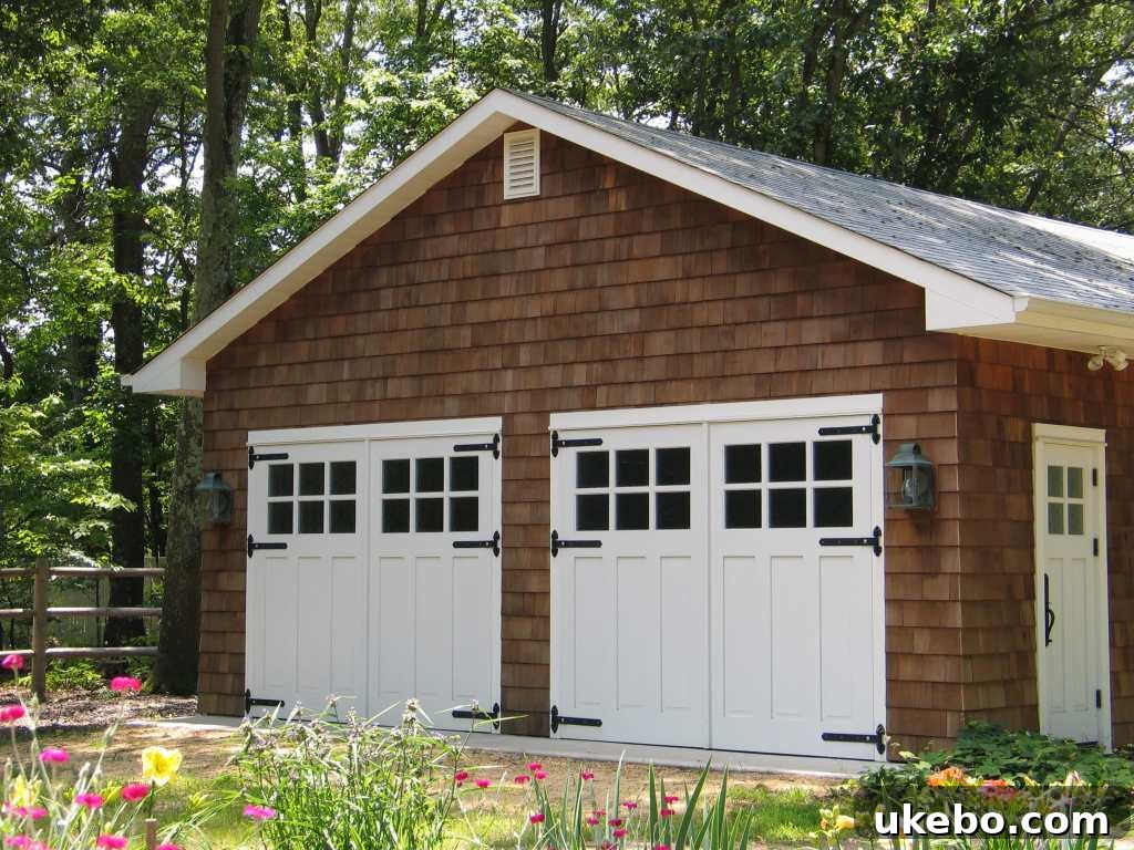 A beautiful carriage-style garage door adding significant curb appeal to a home.