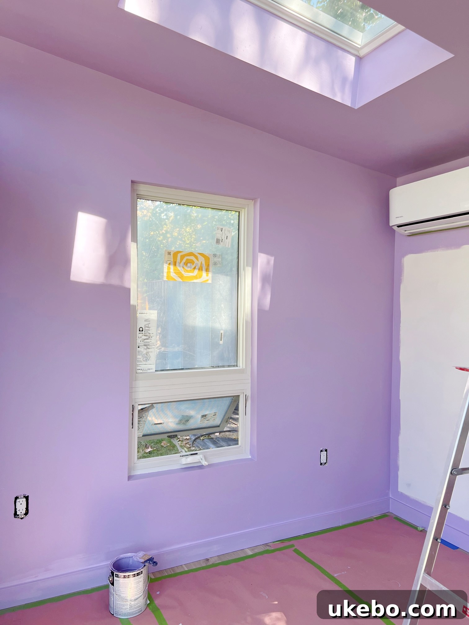 Freshly painted wall in Sherwin-Williams Magical purple in the office studio