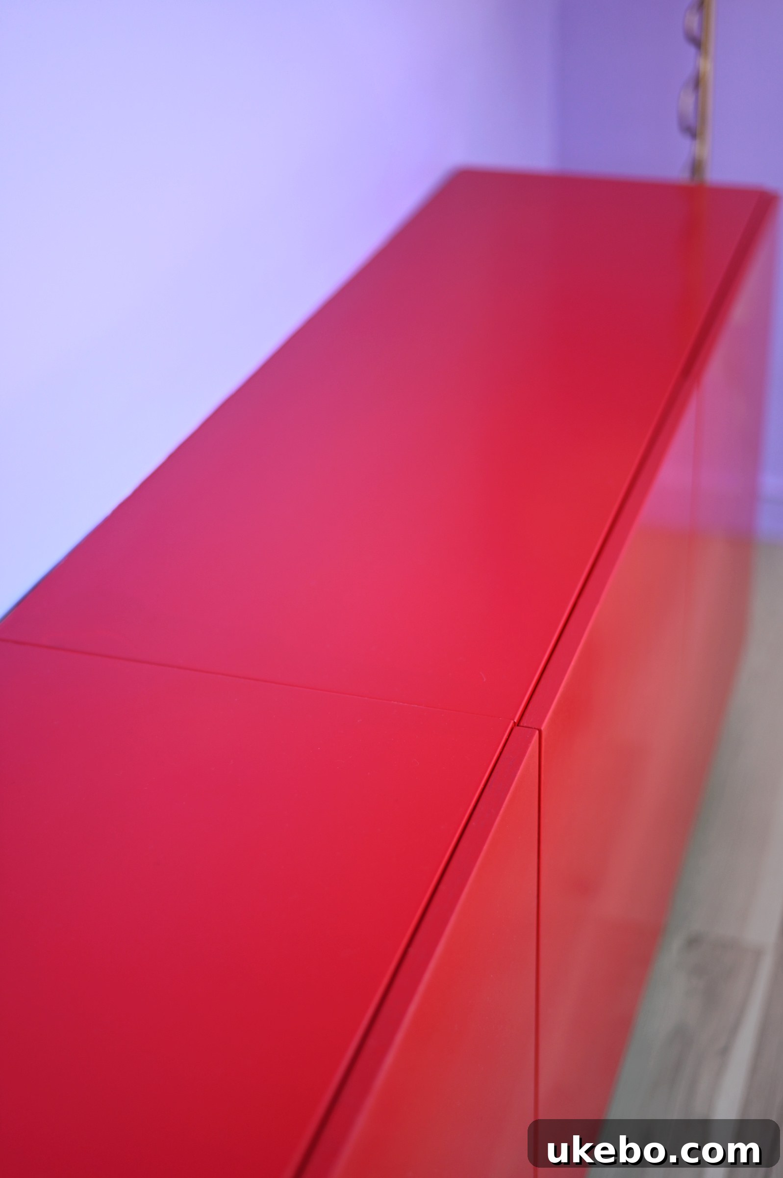 Completed office studio showing the harmonious blend of Magical purple walls and Positive Red accents