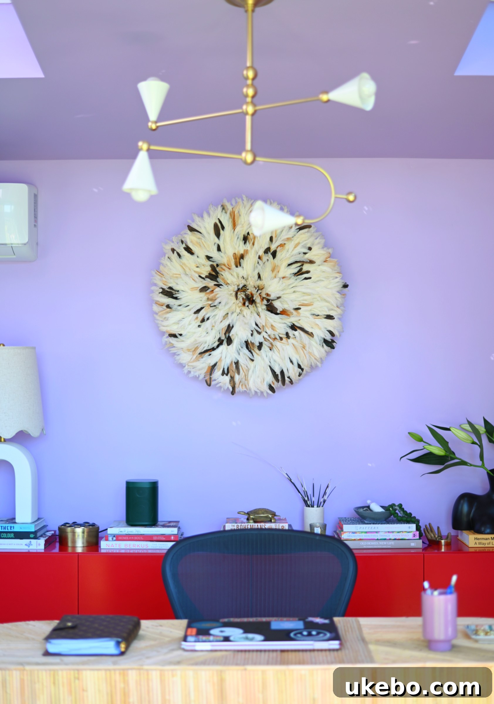 Corner of the office studio featuring unique decor and paint colors