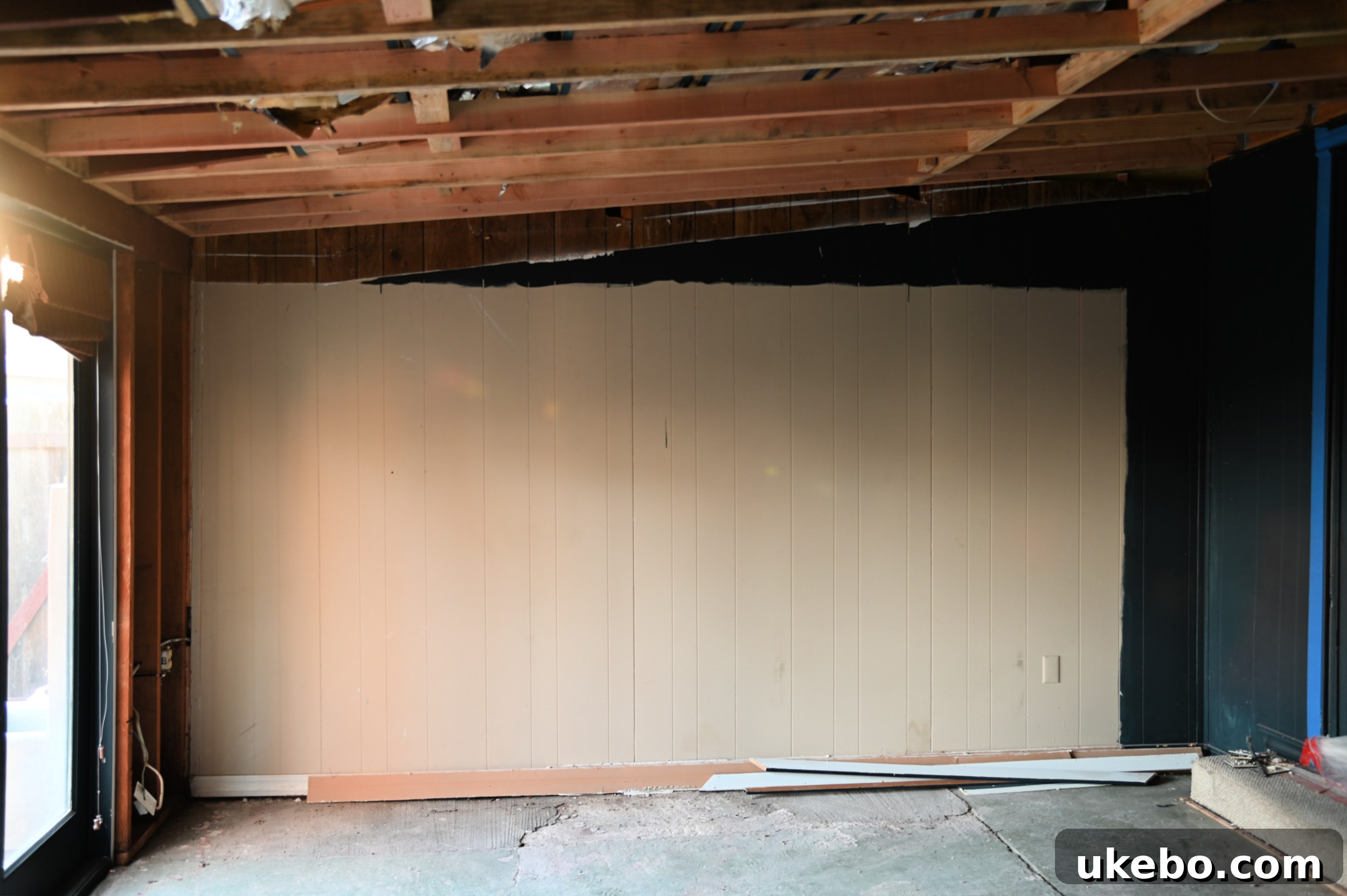 Demolition in progress, showing walls opened up.