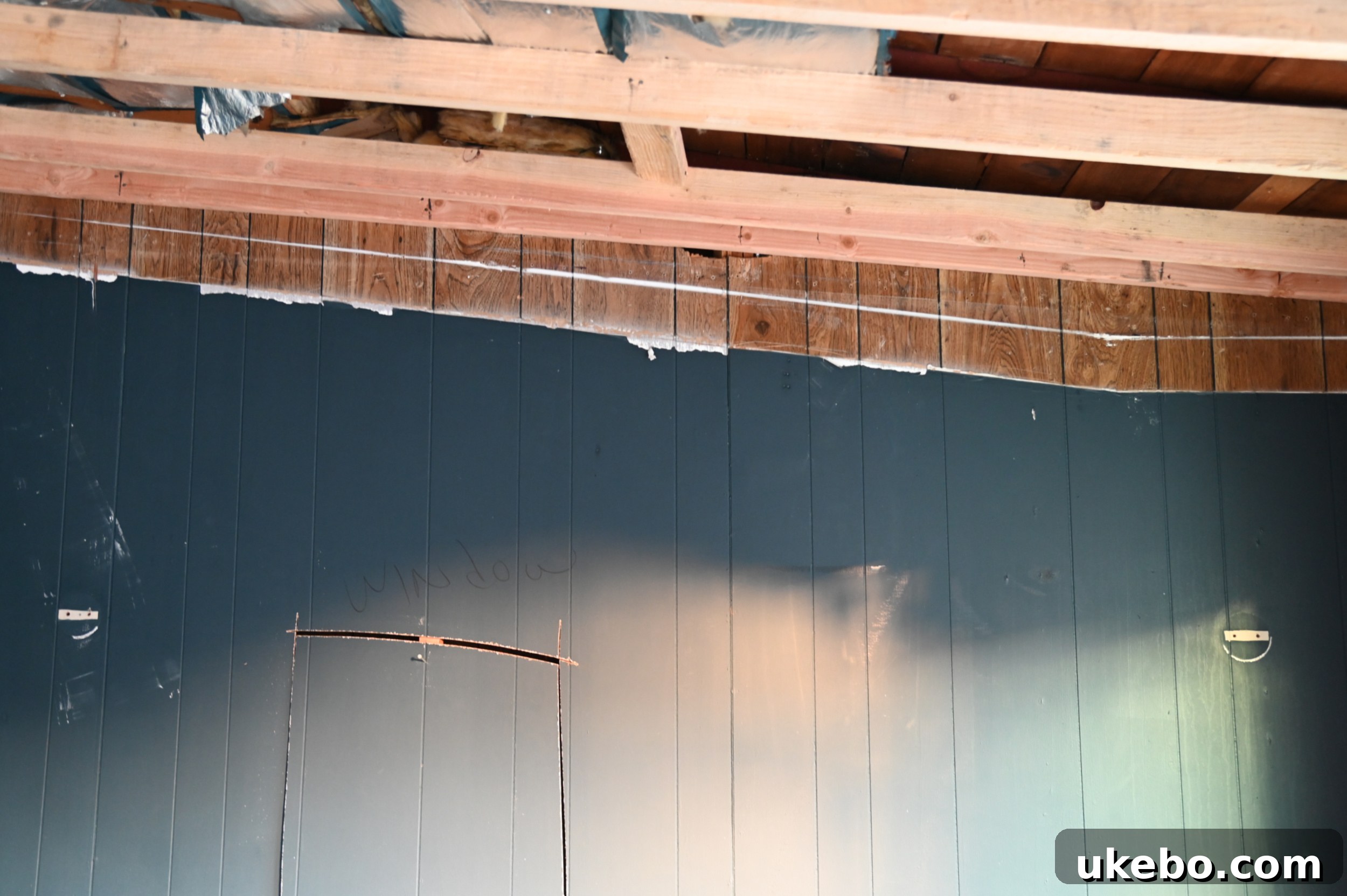 New ceiling framing showing increased height.