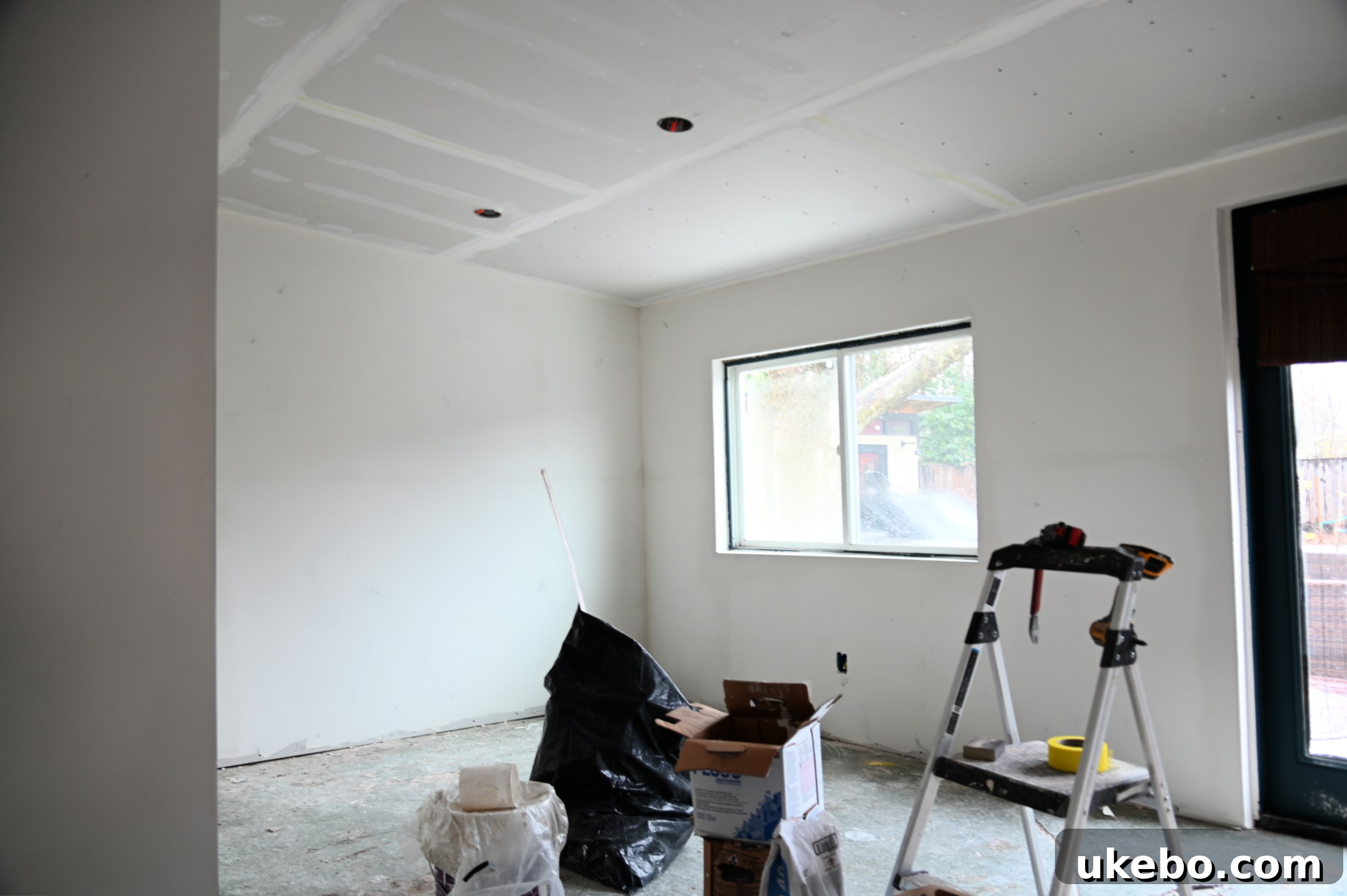 Ceiling re-framed for new overhead lighting.