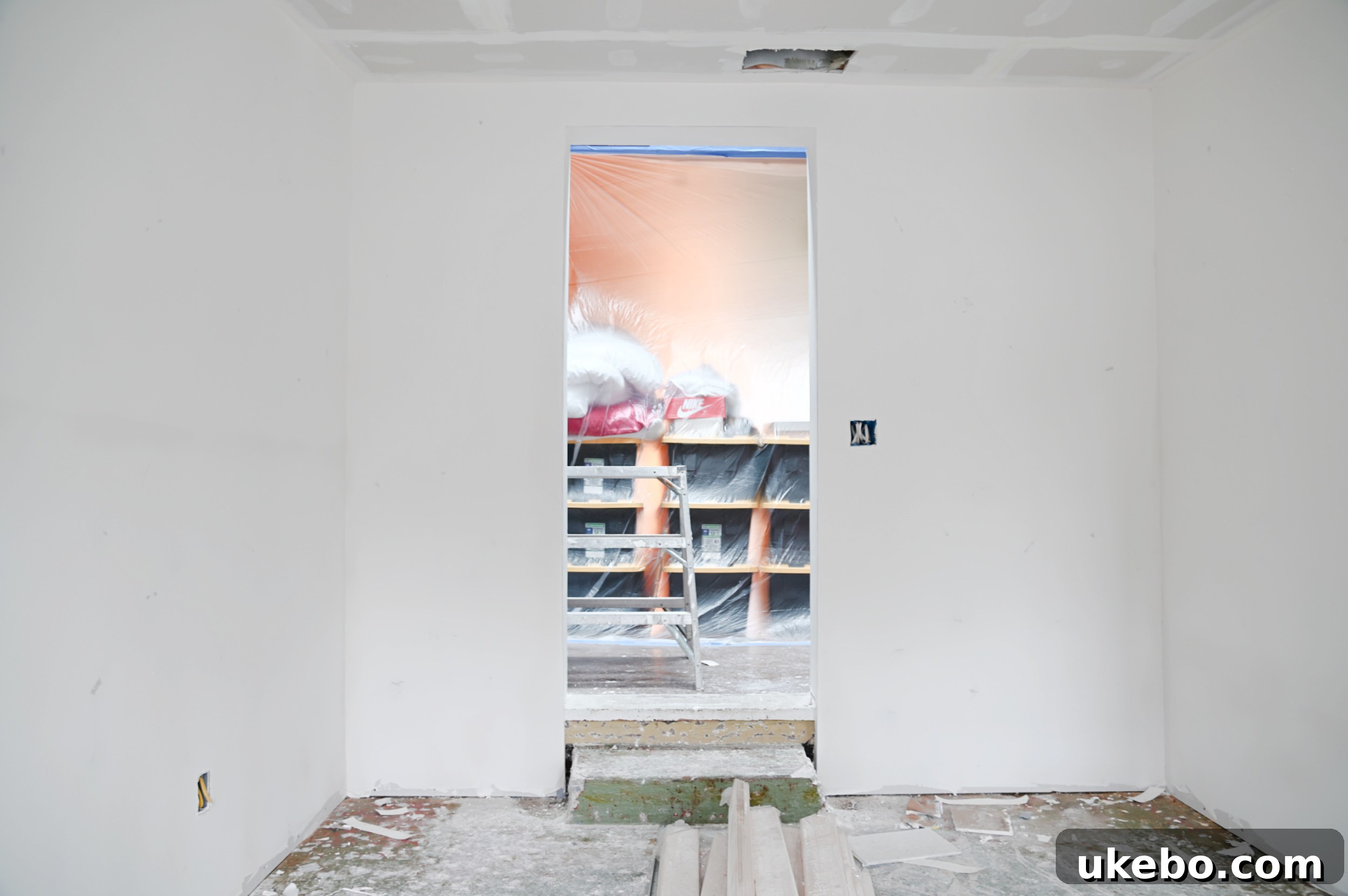 Overview of the room with new framing and electrical.