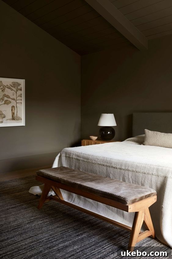Wabi-sabi inspired bedroom with muted tones and natural textures.