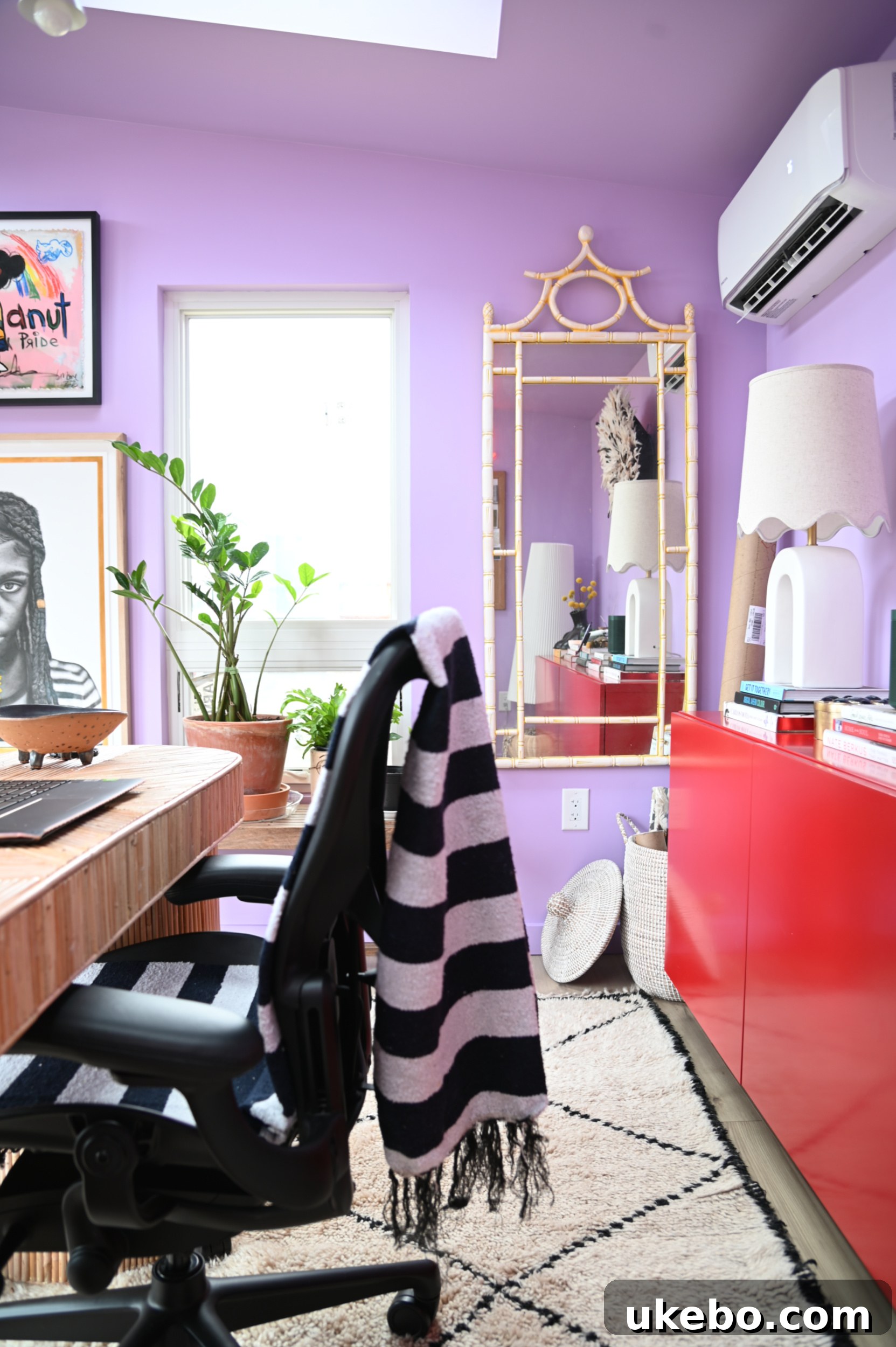 Closer view of the finished SG Style Studio interior, showcasing custom art and decorative elements.