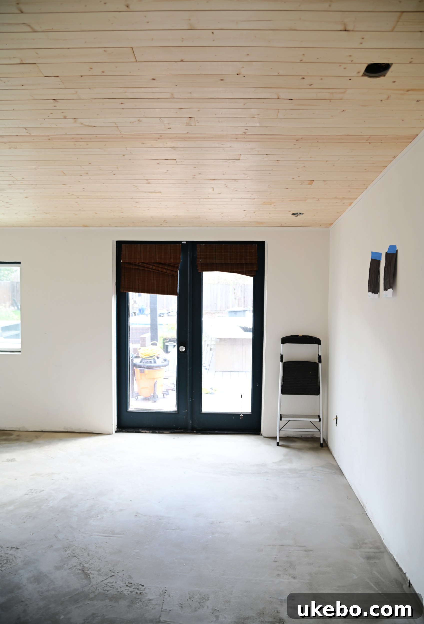 Weathering the Storm: Crafting a Dreamy Cave Sanctuary 4 A closer look at the updated ceiling with tongue and groove planks, adding texture and architectural interest to the primary bedroom.