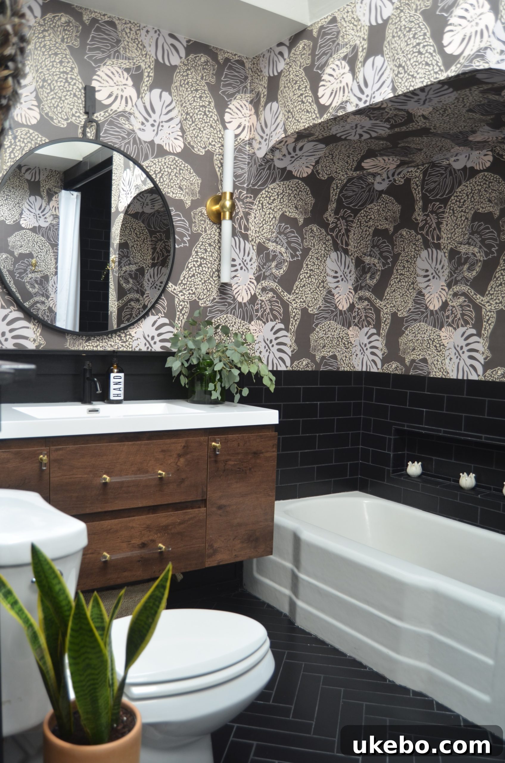 Modern bathroom with white tiles and elegant fixtures
